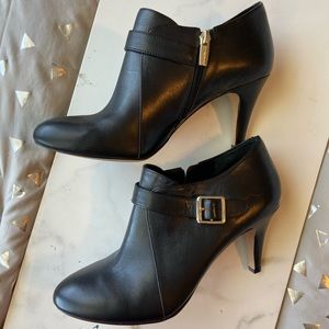 Vince Camuto Black bootie with gold buckle and zip
